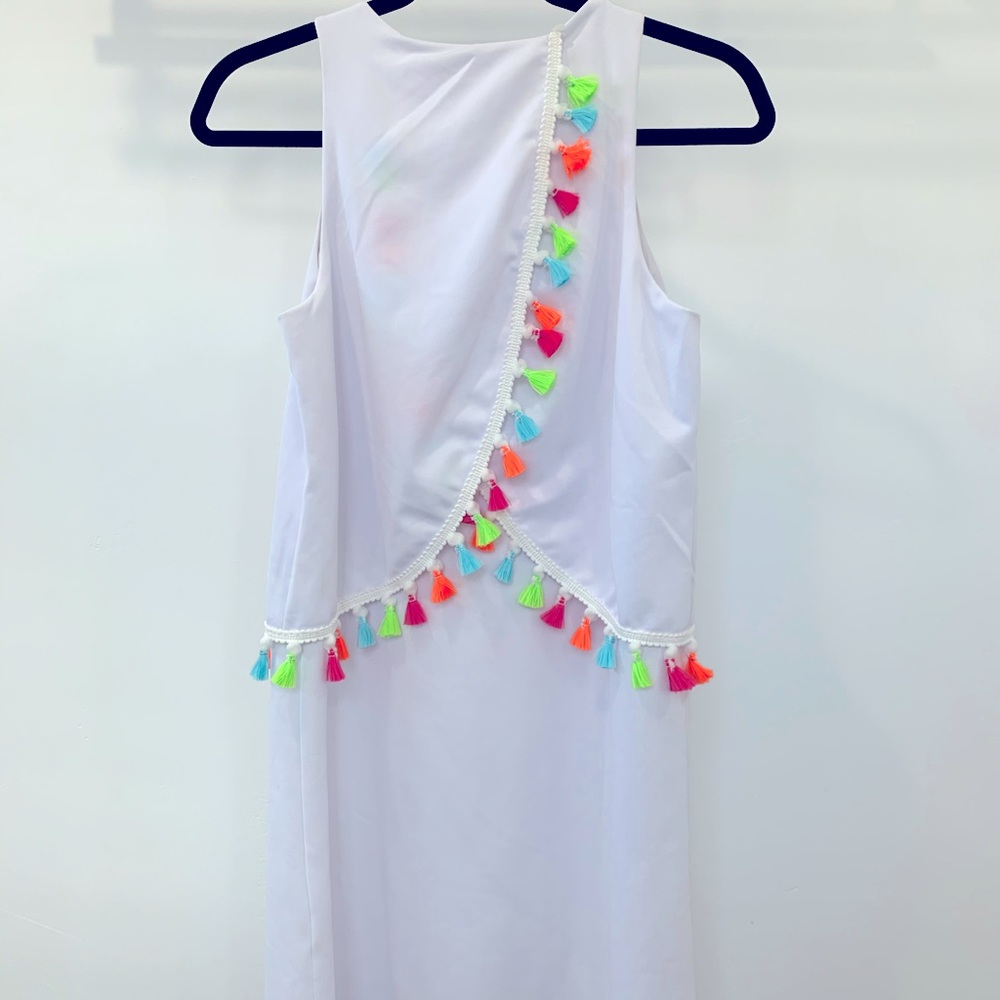 White dress with tassels